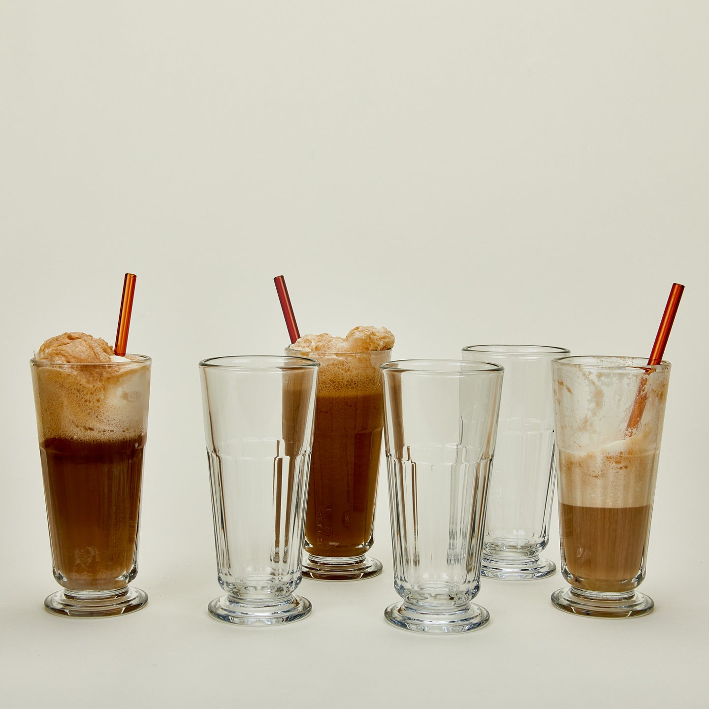 Six Perigord highball glasses, some with root beer floats.