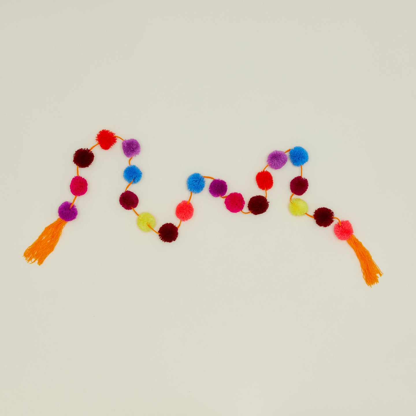 Magic pom pom garland in multicolor flash