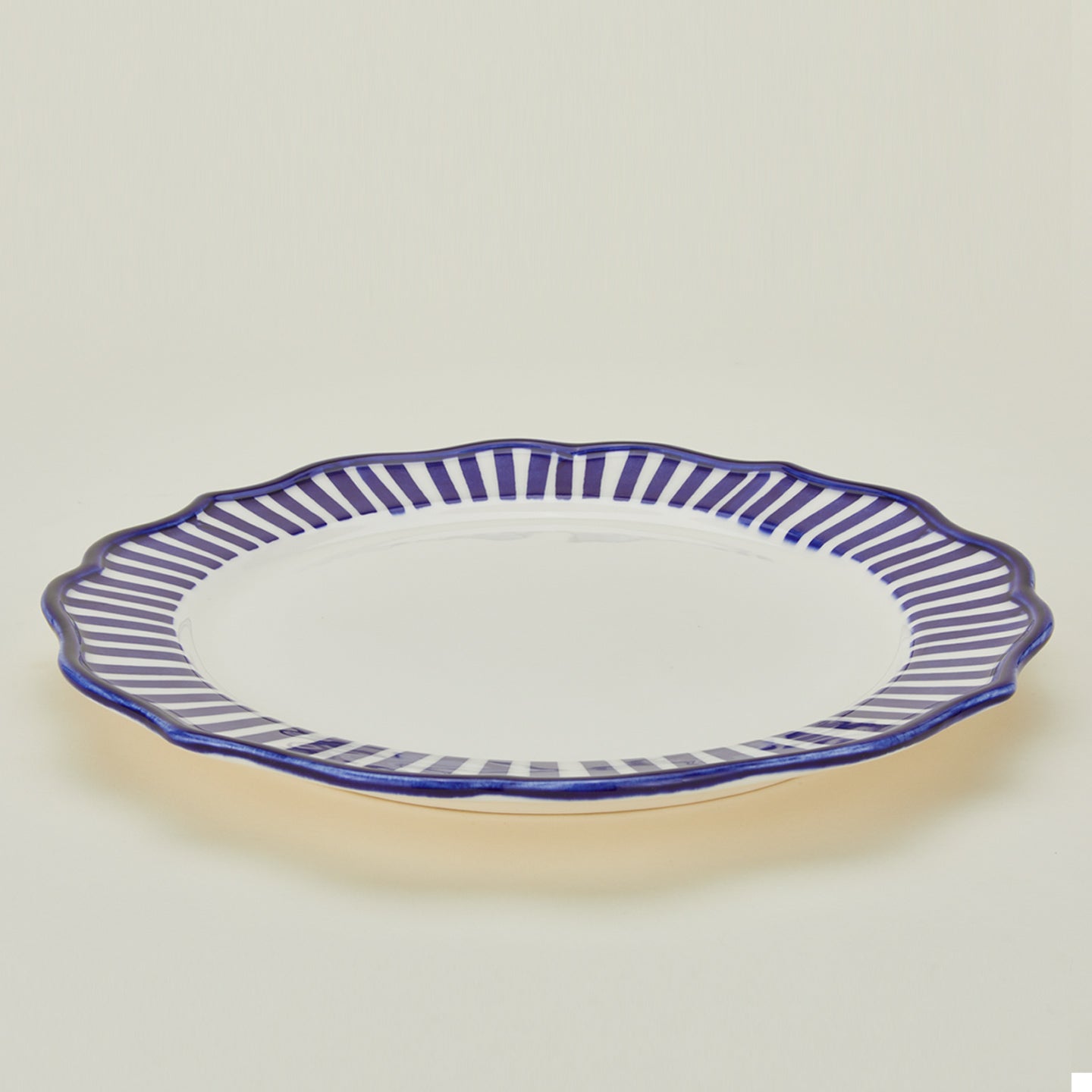 Striped edge round platter