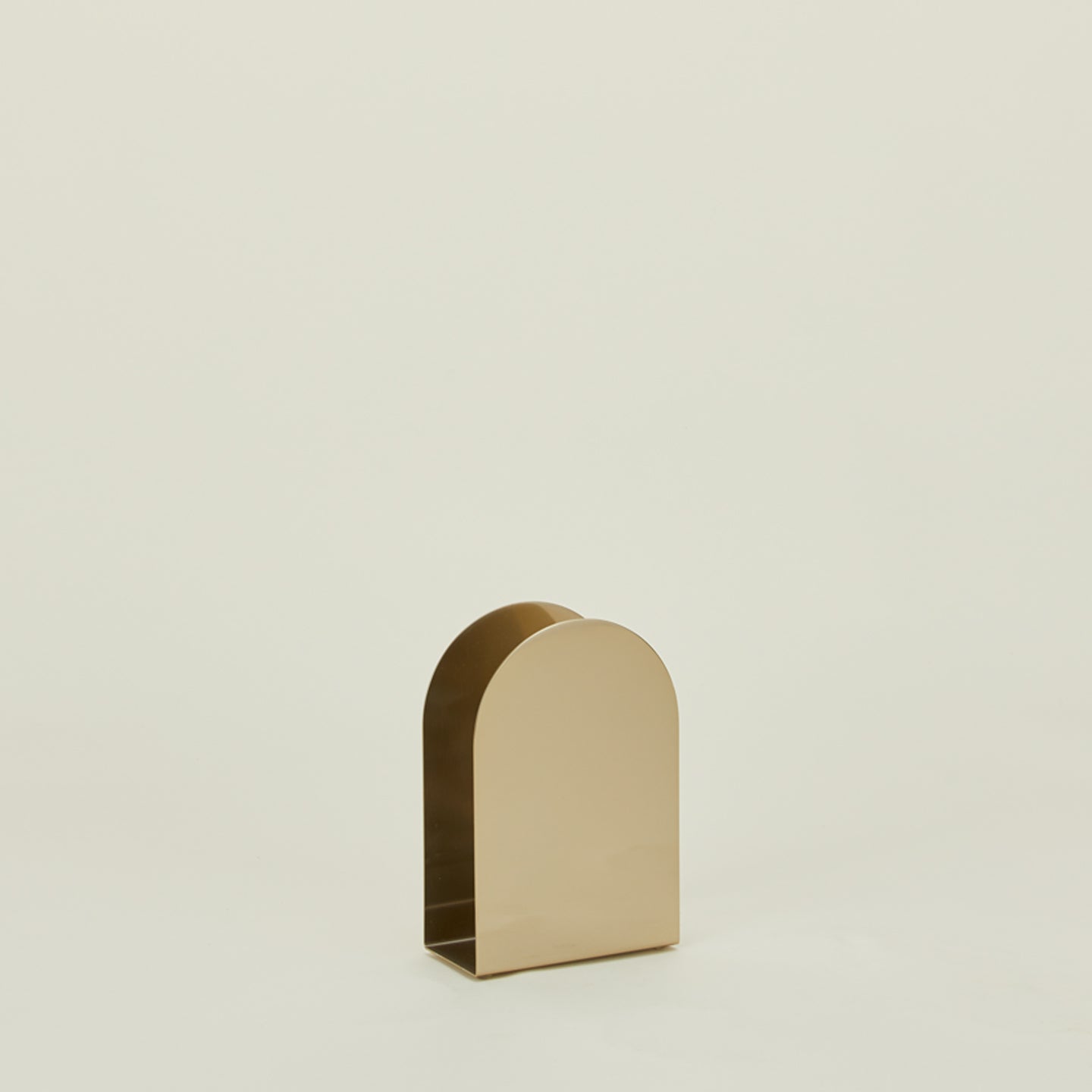 Arco brass napkin holder.