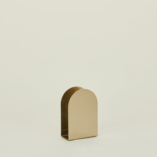 Arco brass napkin holder.