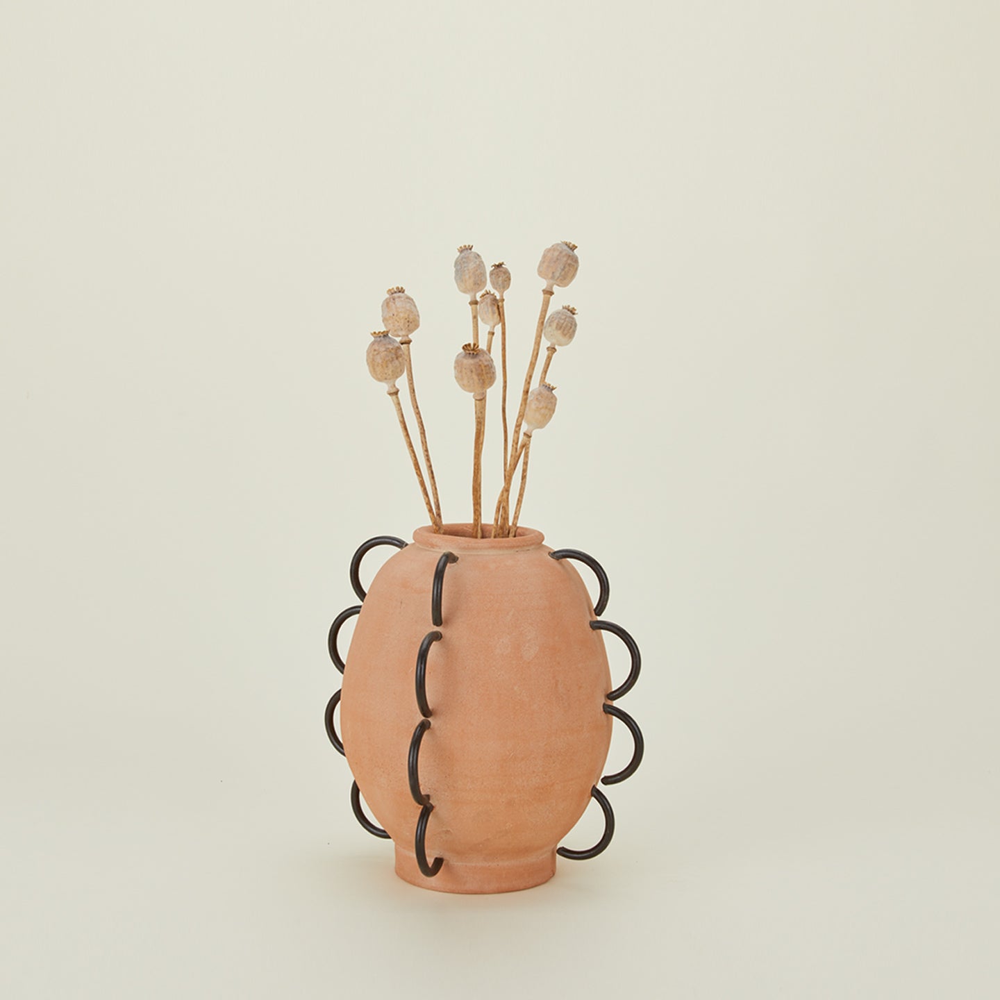 Ella terracotta and iron vessel with florals.