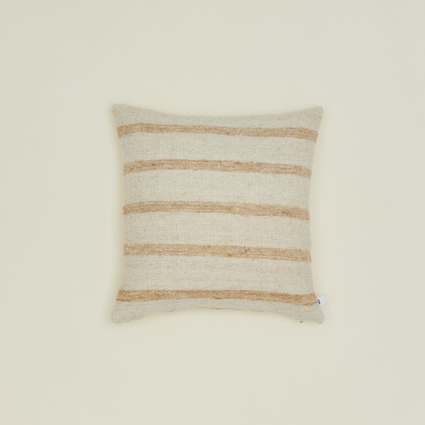 Striped Linear wool pillow in tan and ivory.