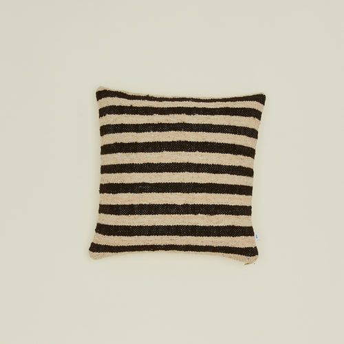 Striped wool pillow in black and tan.