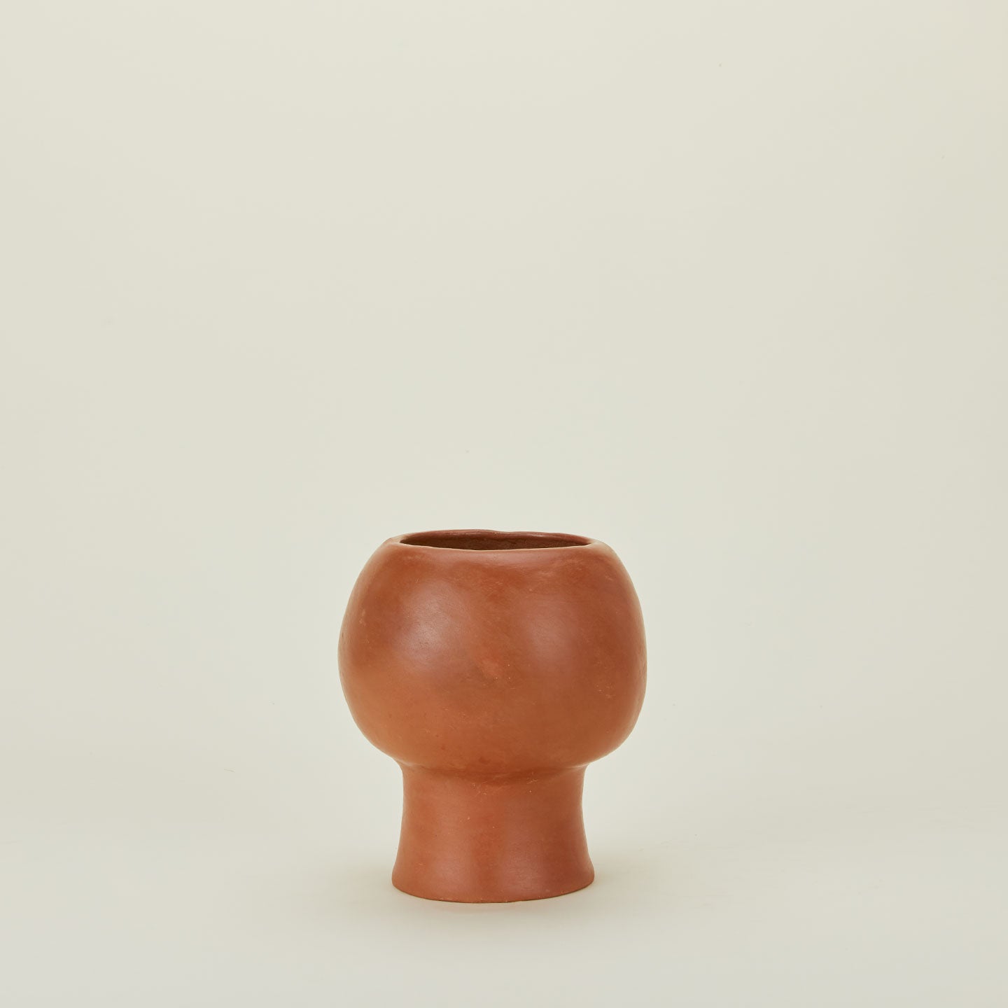 Trompo terracotta vase.