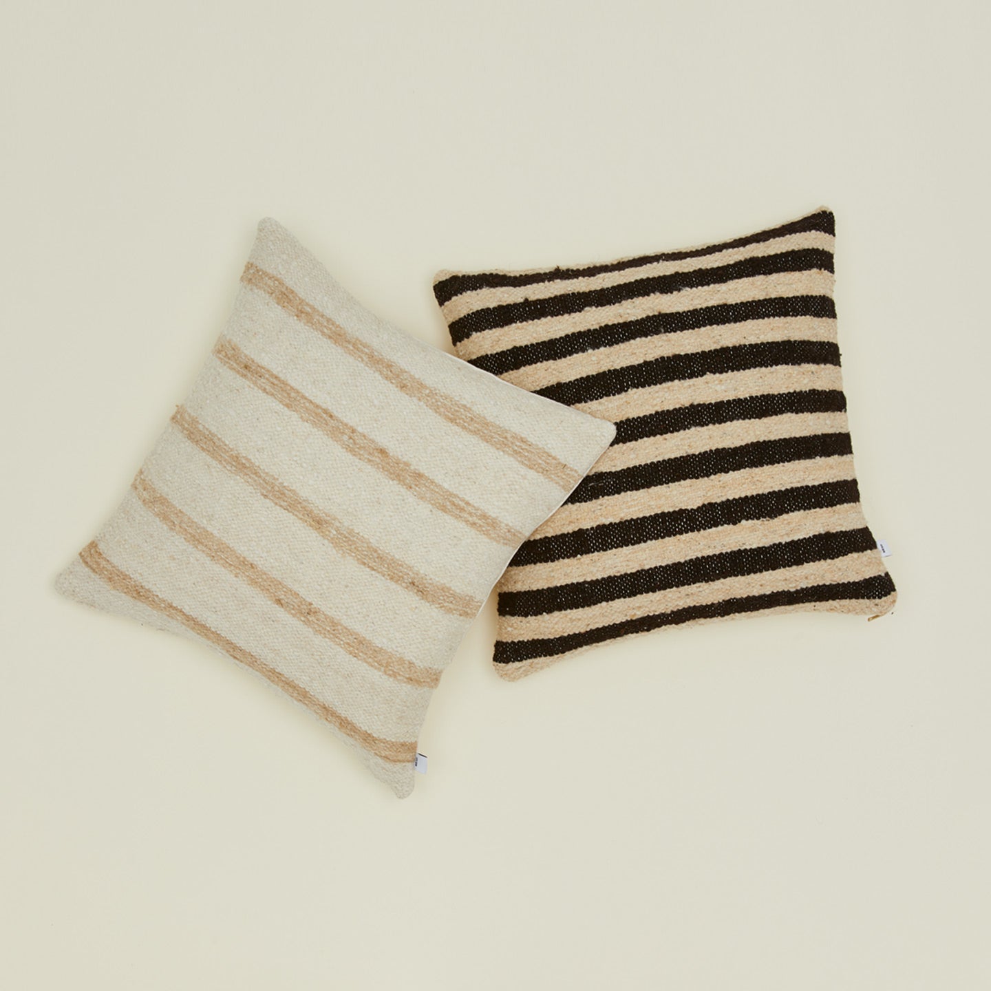 Striped wool pillows in various colors.