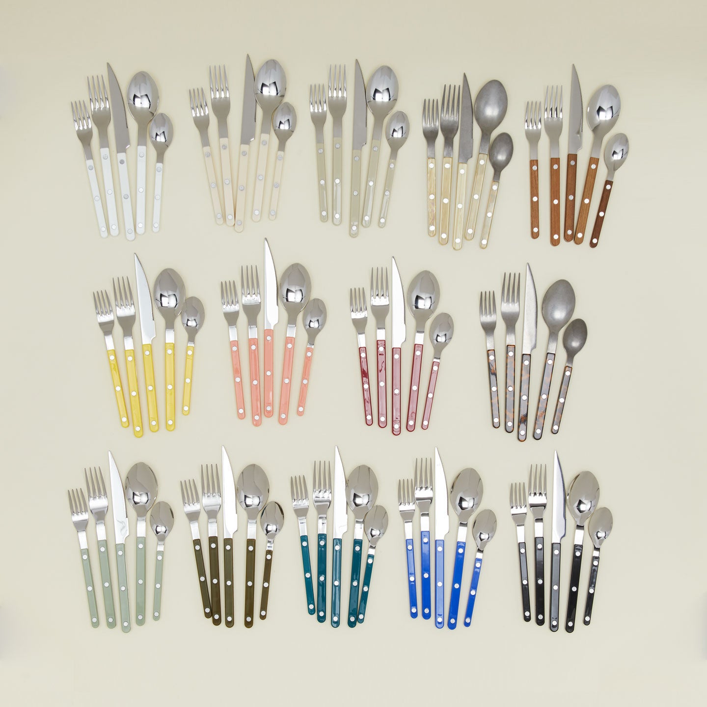 Group of Bistrot Flatware Sets in various colors.