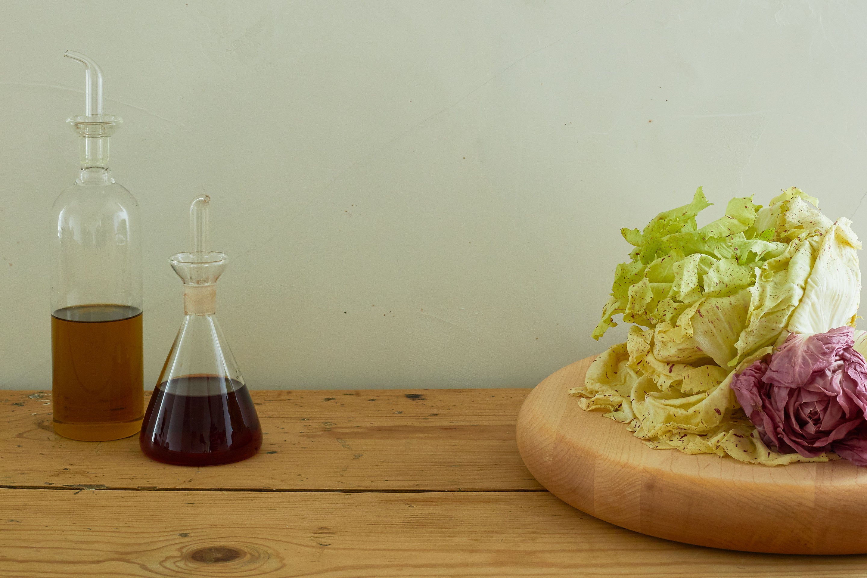 Salad dressing ingredients on a table. 