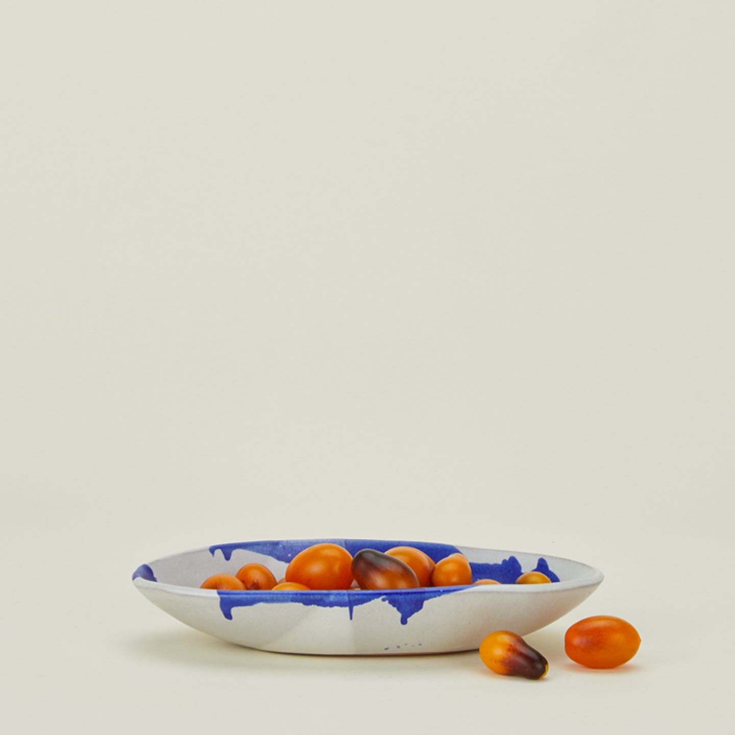 Oval serving dish with cherry tomatoes