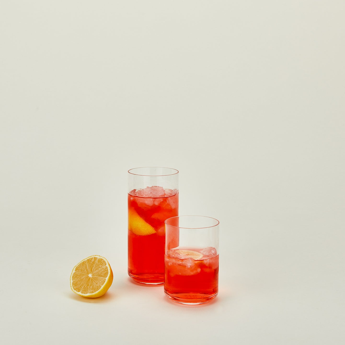 Simple glassware family with sangria and orange