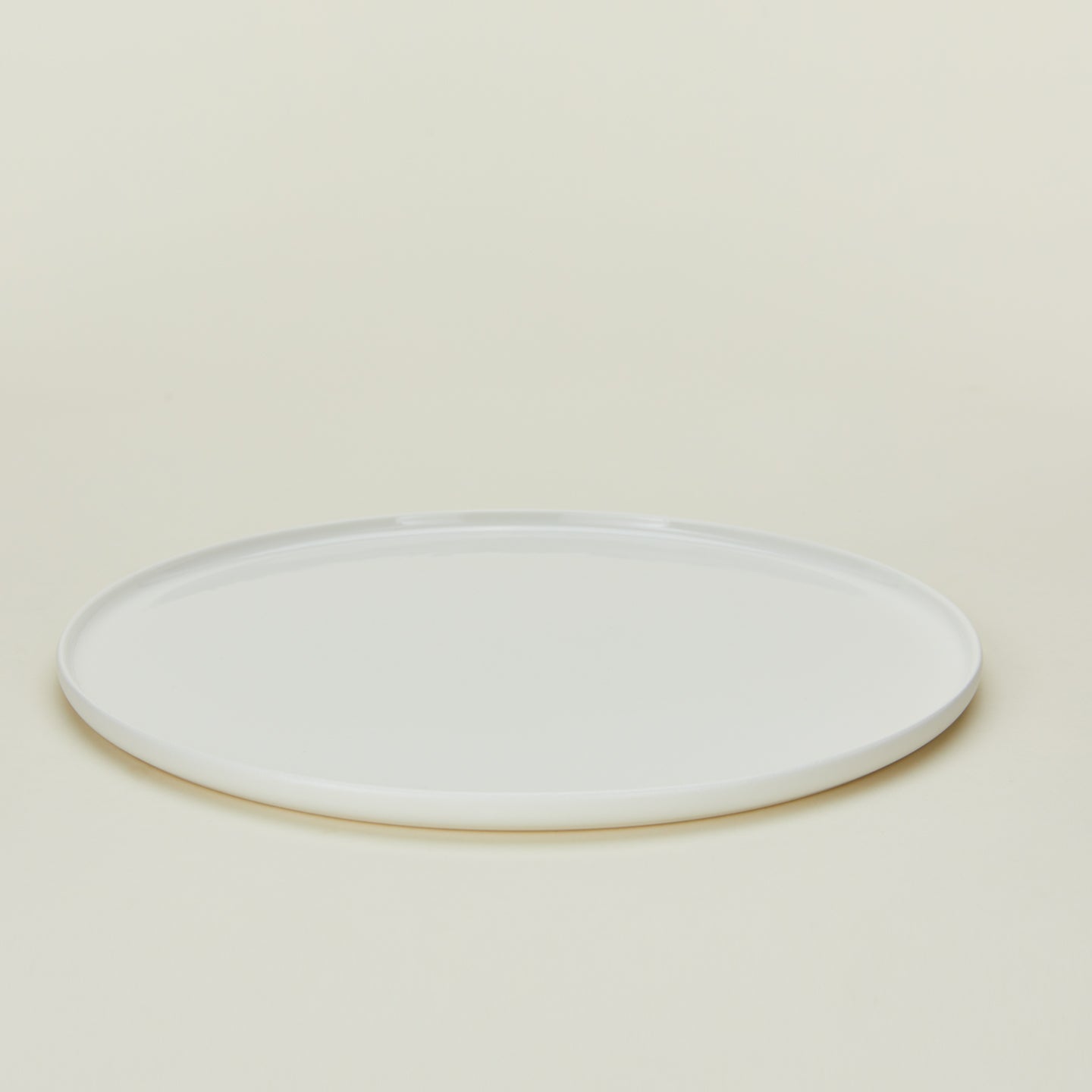 Simple porcelain dinner plate in white