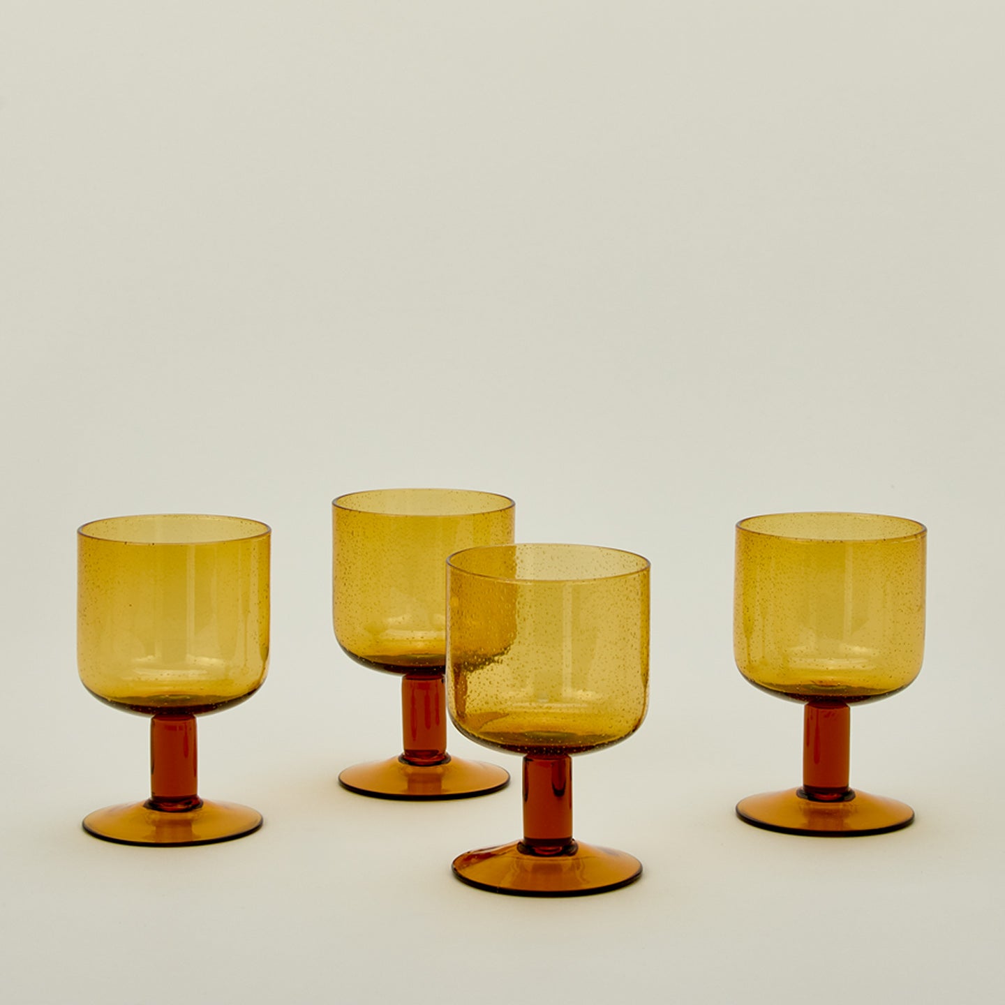 Simple seeded glassware in amber