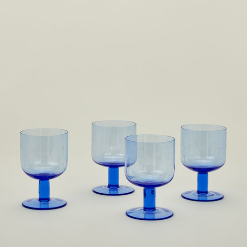 Simple seeded glassware in blue.