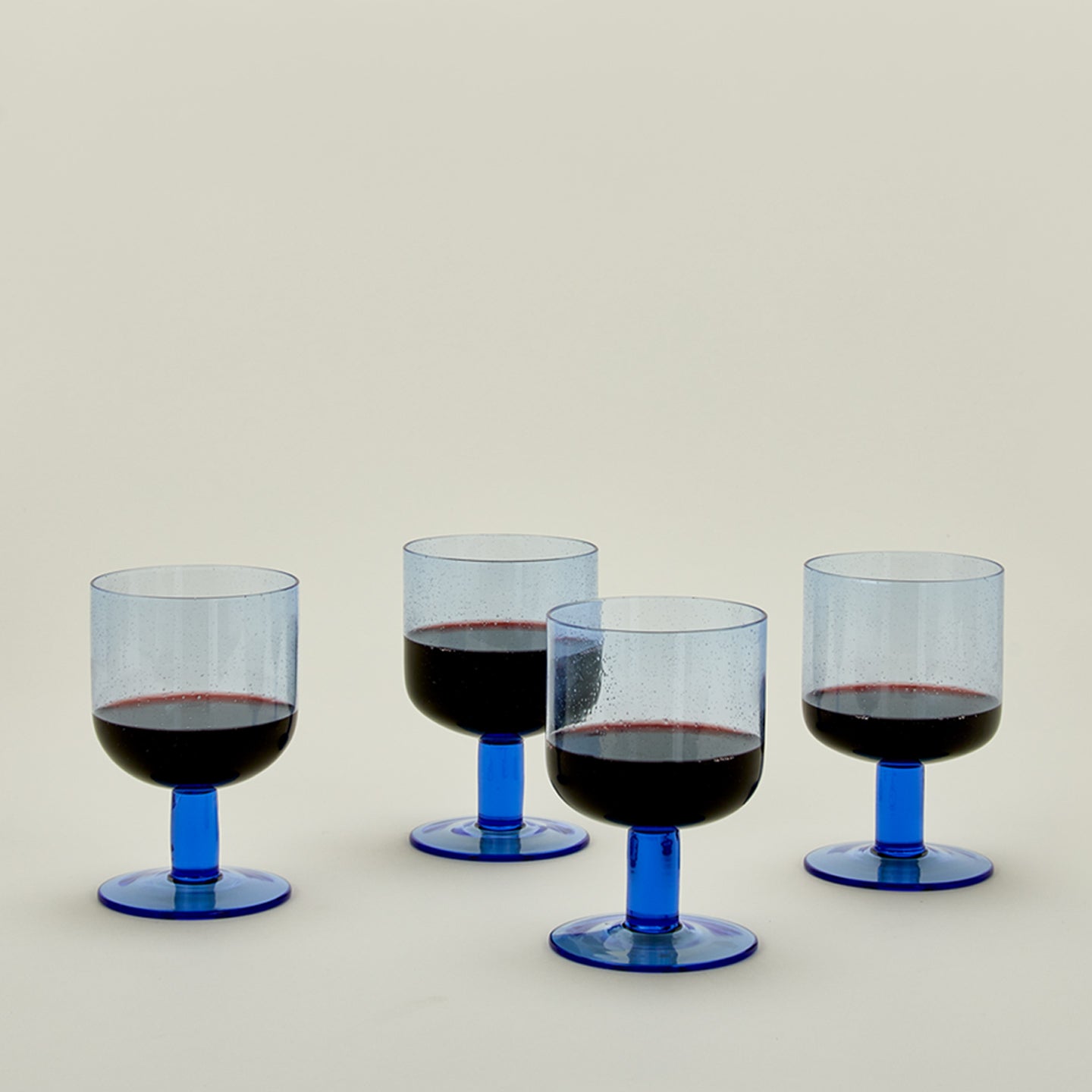 Simple seeded glassware in blue.