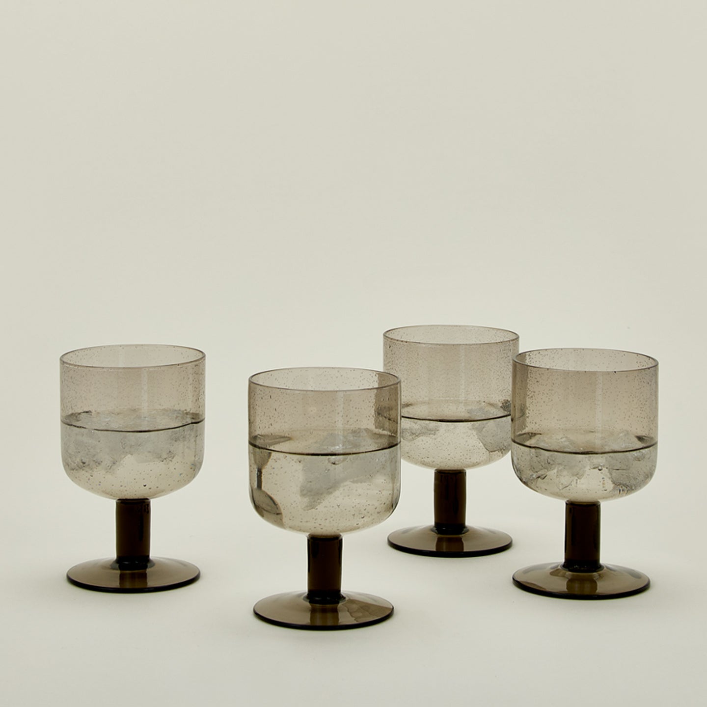 Simple seeded glassware in smoke