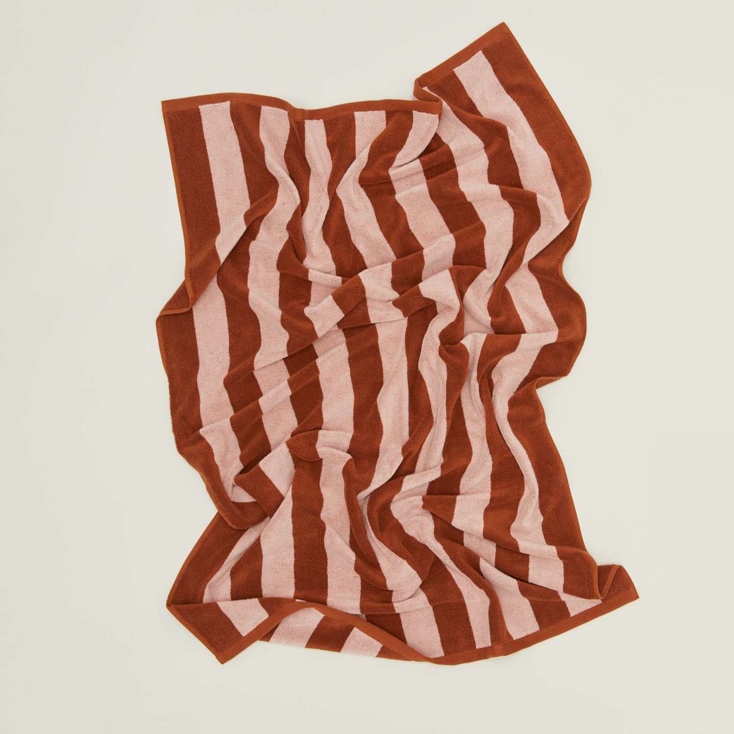 Oversized Simple Striped Terry Towel in blush and terracotta.