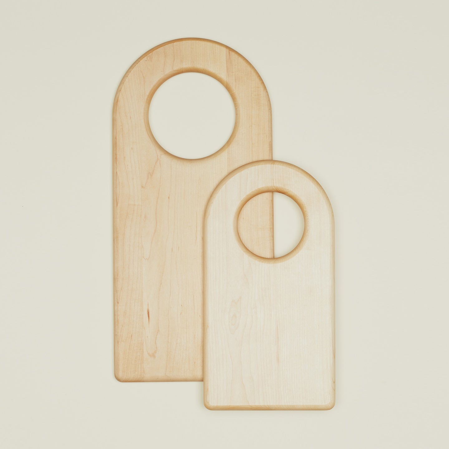 Large and small stacked arched cutting boards 