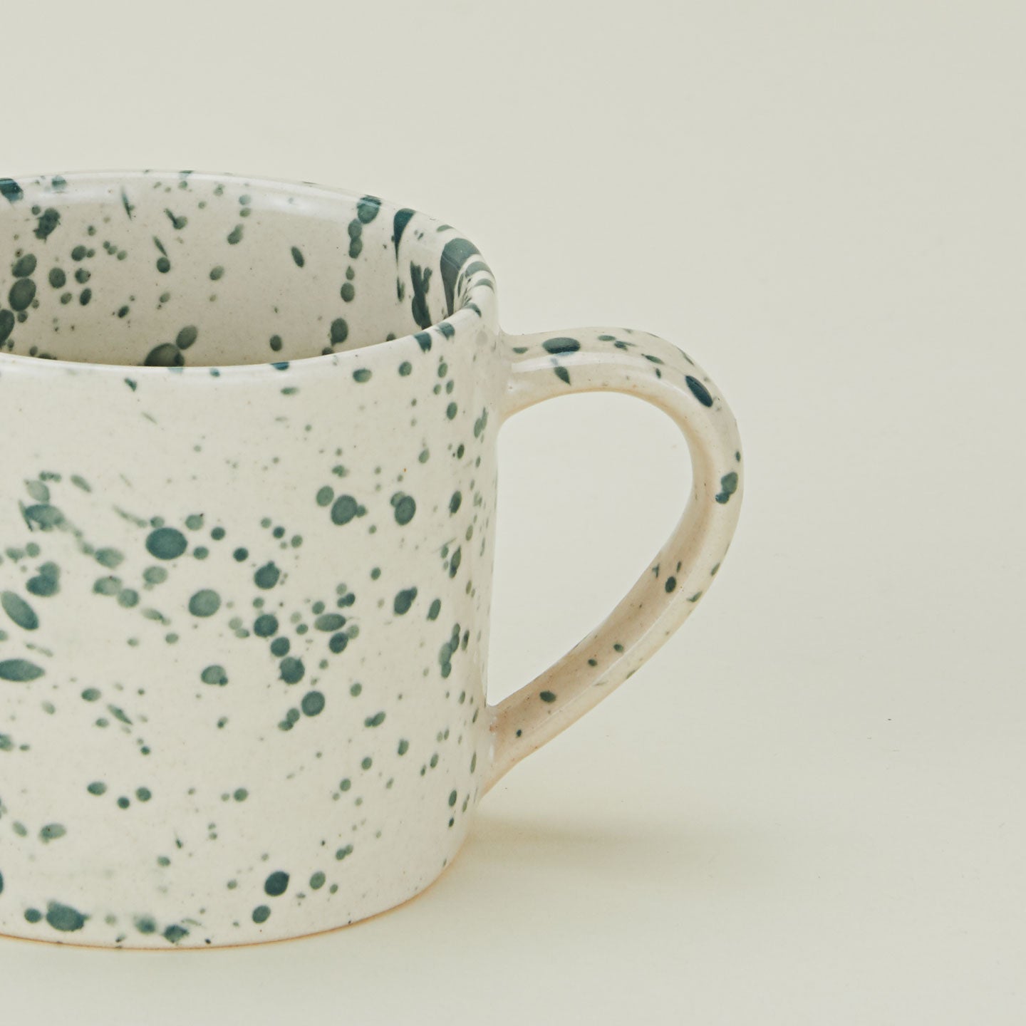 Close up of a Splatterware Mug in Nettle.