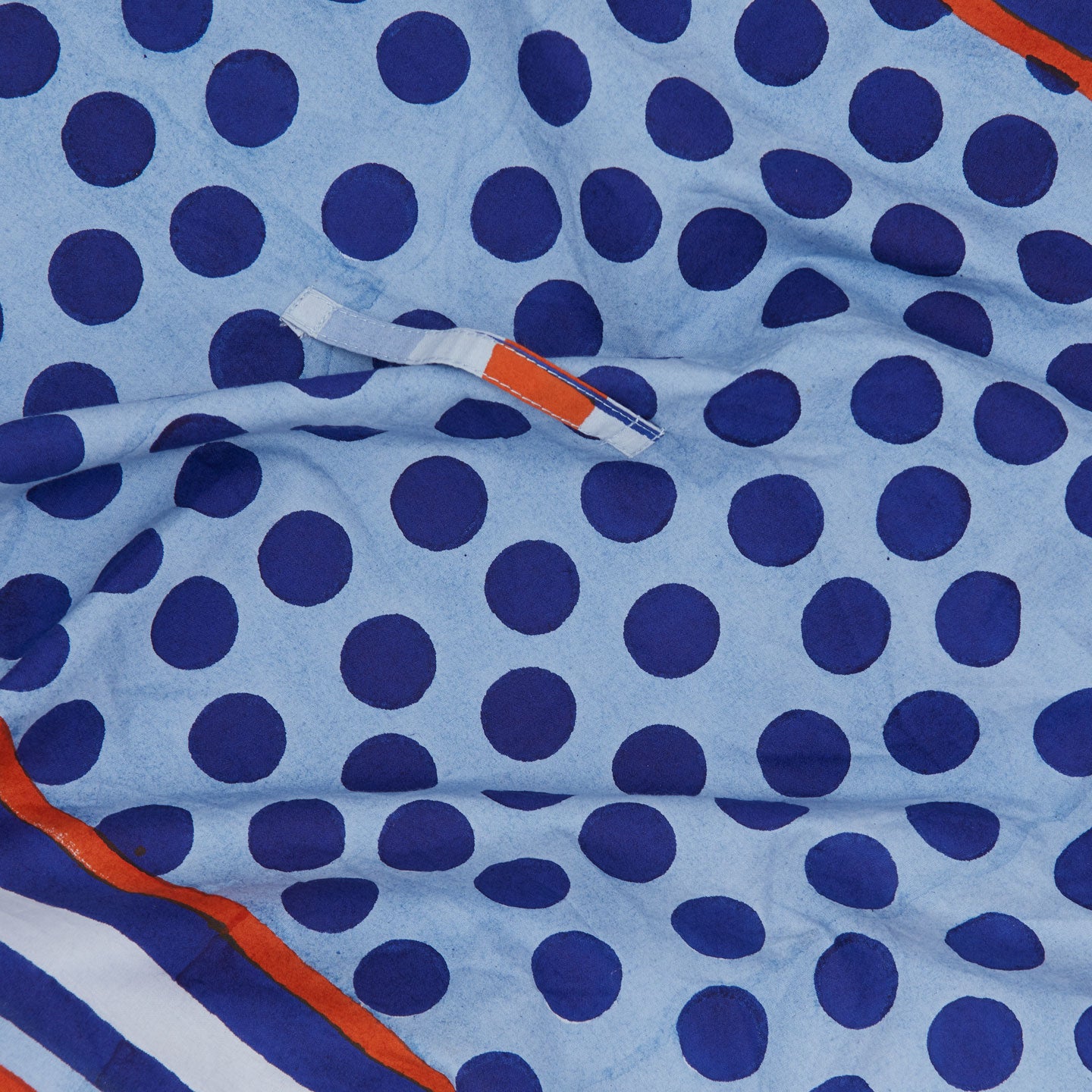 Close up of Block Printed Dish Cloth in Blue Dot.