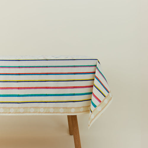 Block Printed Tablecloth in Multi Stripe on table.