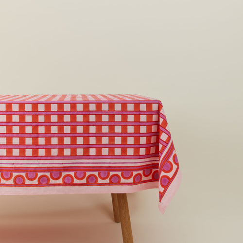 Block Printed Tablecloth in Red Plaid on table.