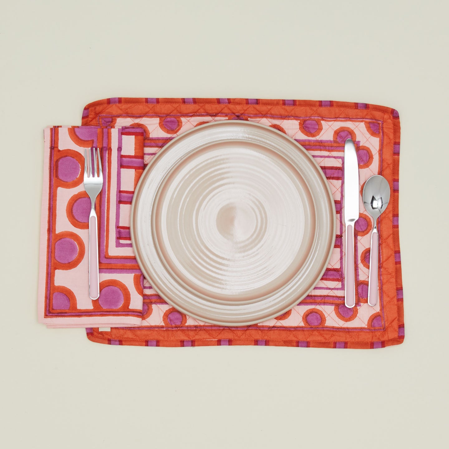 Place setting with Block Printed Quilted Placemat in Red Plaid.