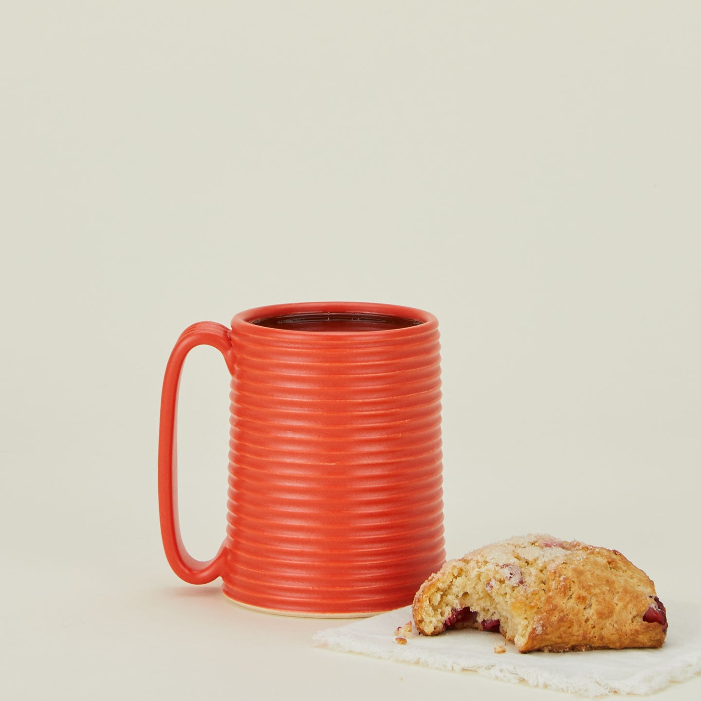 Tall Ribbed Mug in Papaya.