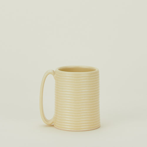 Tall Ribbed Mug in Butter.