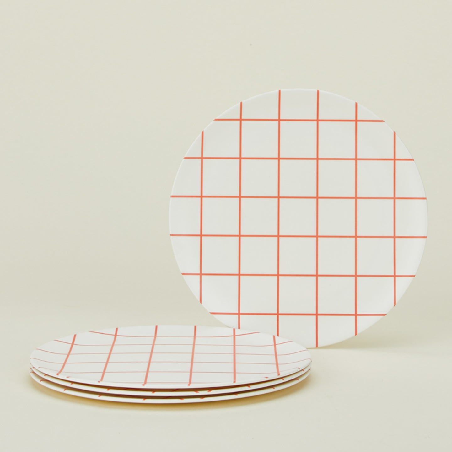 Set of 4 bamboo melamine dinner plates in Red Grid.