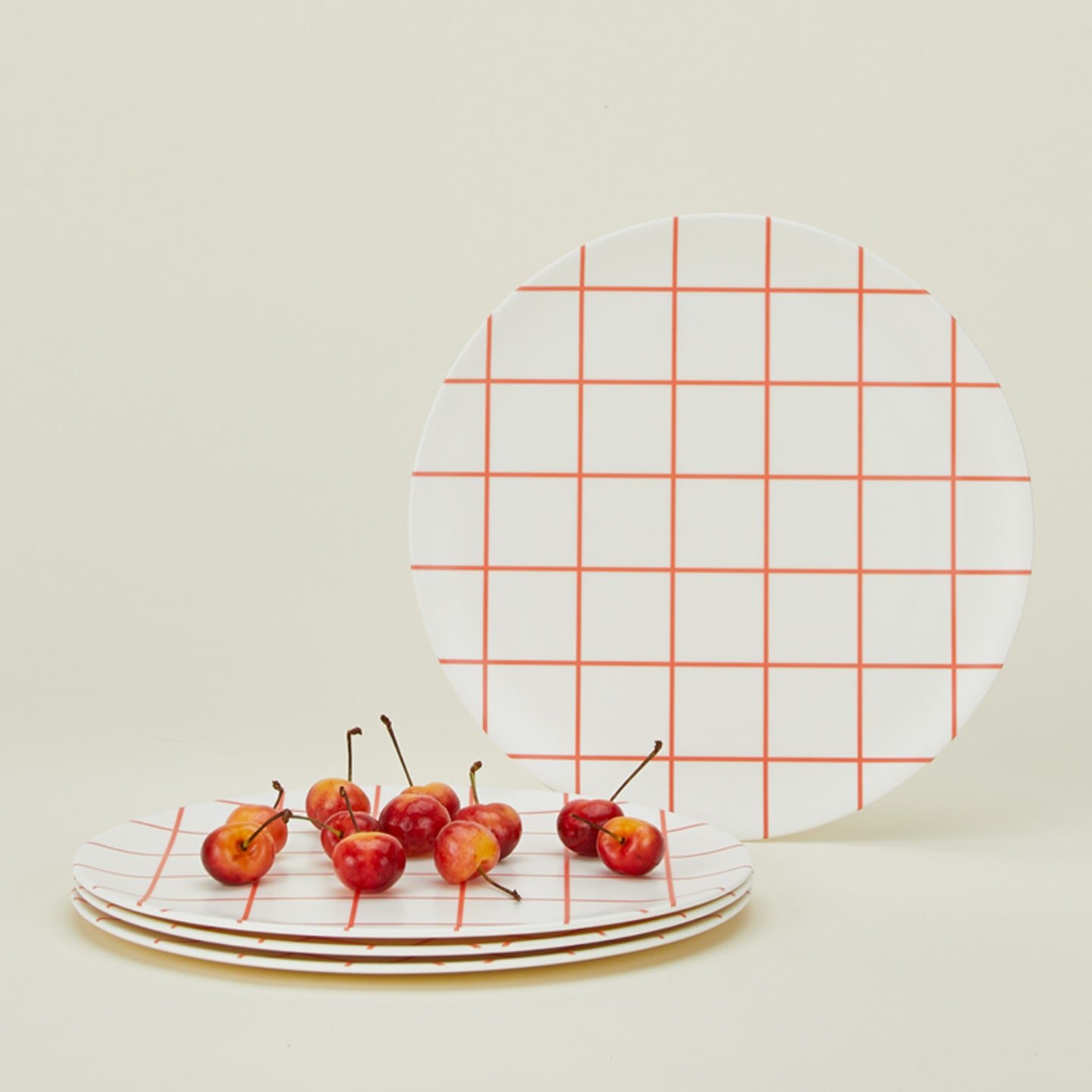 Set of 4 bamboo melamine dinner plates in Red Grid.