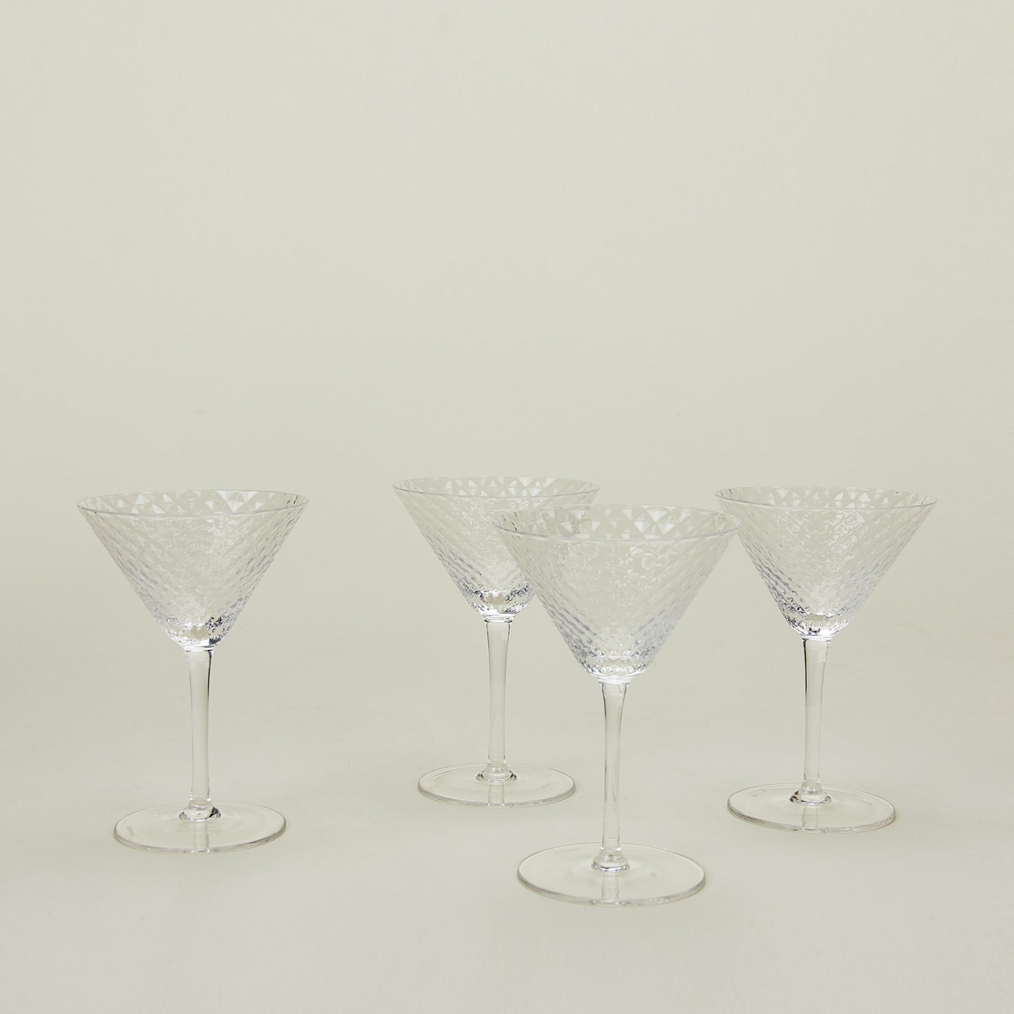 Four Veneziano martini glasses.